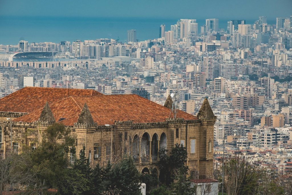 Aerial view of Beirut's cityscape featuring historic architecture and urban skyline.